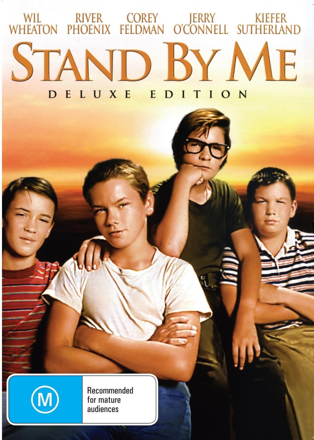 DVD cover of "Stand by Me" comedy featuring Wil Wheaton and River Phoenix, showcasing the movie's title and main actors.
