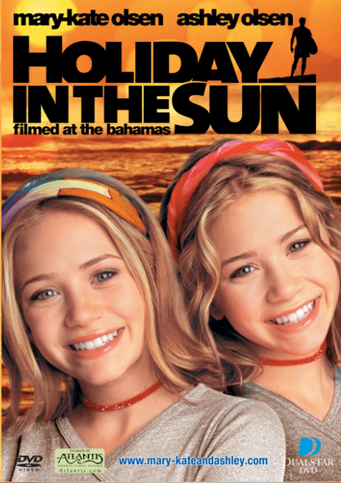 DVD cover for the movie 'Holiday in the Sun' featuring Mary-Kate and Ashley Olsen smiling against a tropical beach backdrop with large black title text at the top.