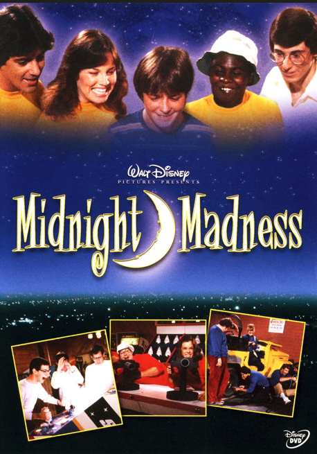 DVD cover of Midnight Madness comedy featuring David Naughton and Debra Clinger, with colorful nighttime cityscape background.