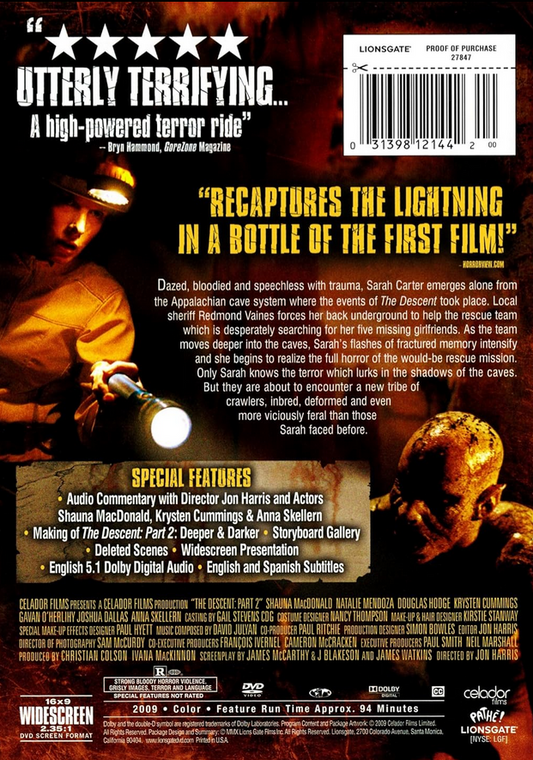 Screenshot from The Descent Part 2 DVD, horror movie starring Shauna Macdonald and Michael J. Reynolds, showing a tense scene.