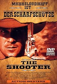 DVD of Deadly Shooter drama featuring Michael Dudikoff and Randy Travis, showing the movie cover with title and actors.
